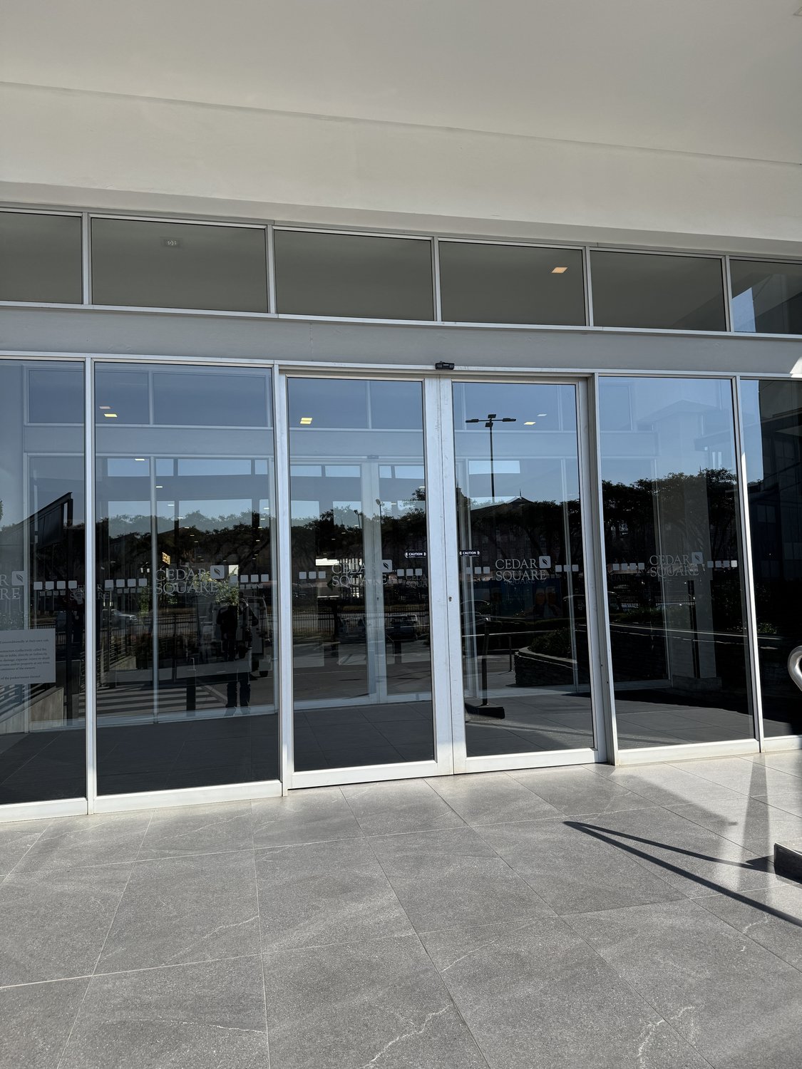 Automatic doors KwaZulu-Natal — automatic sliding glass door entrance at a commercial building | Coetz Glazing / MC Automations